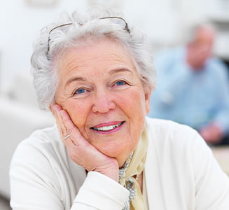 Photo of a woman smiling. Link to Life Stage Gift Planner Over Age 70 Gifts.