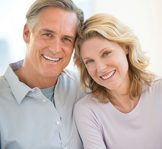 Photo of a couple smiling. Link to Life Stage Gift Planner Under Age 60 Gifts.